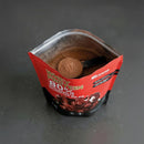 Pote Whey 80 Growth aberto com scoop dosador 20g e po cor chocolate